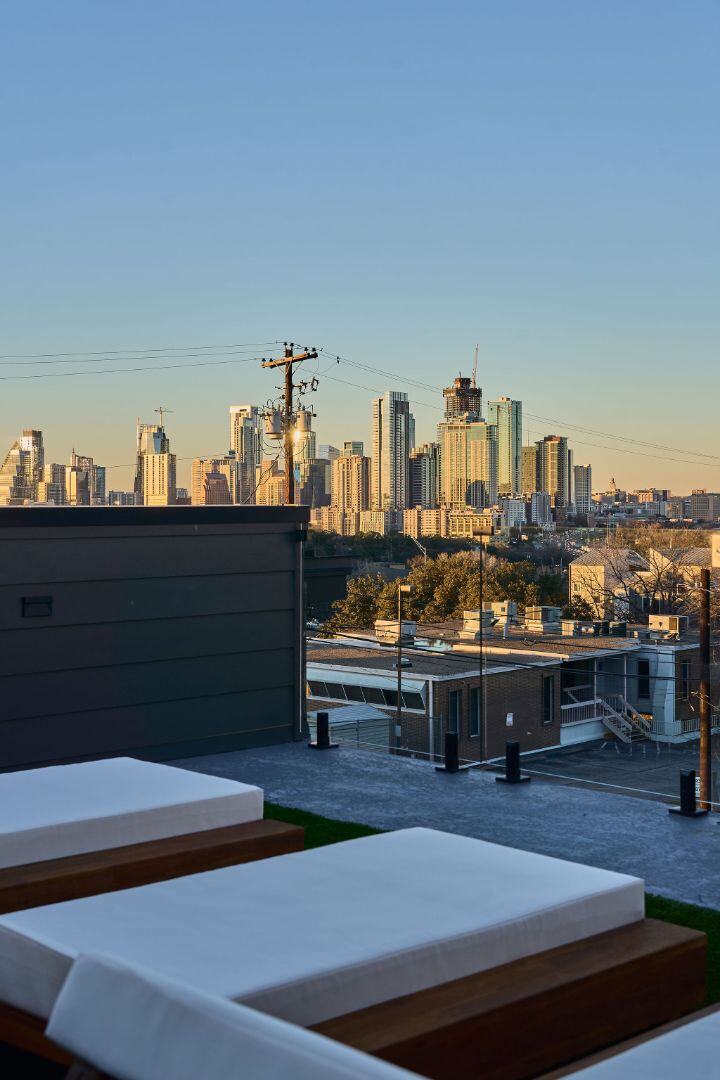 Rooftop lounge with stunning downtown Austin skyline views. Austin, TX | CKN Homes