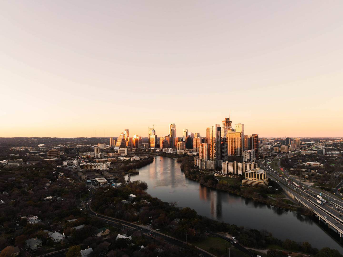 Aerial view of Austin skyline and Lady Bird Lake. Austin, TX | CKN Homes