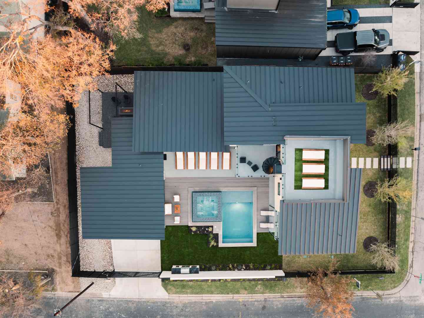 Overhead view of stylish home with pool and rooftop terrace. Austin, TX | CKN Homes