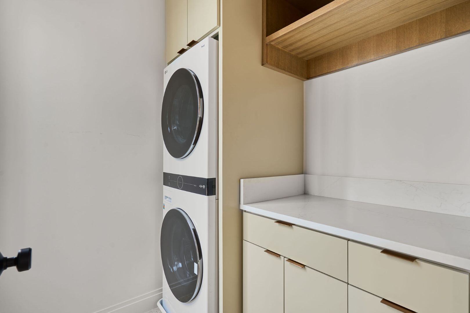 Functional laundry space with modern appliances. Austin, TX | CKN Homes